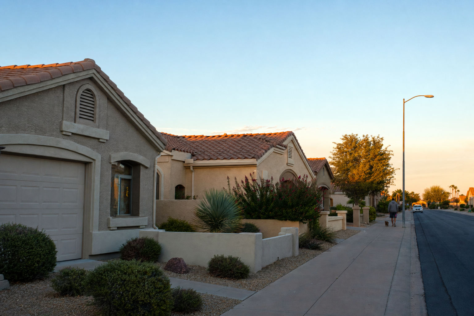 Coordinated warm-neutral home exteriors in a North Phoenix HOA neighborhood